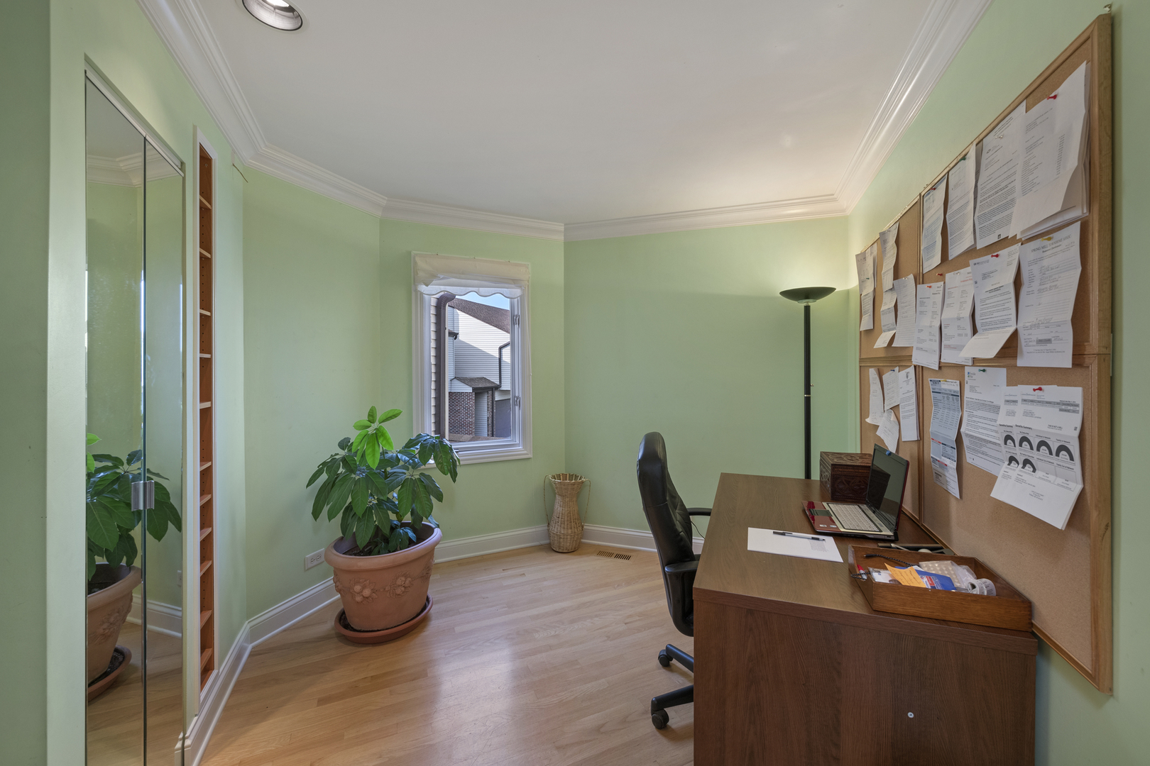 375 Juniper Tree Court Hoffman Estates, IL 60169 - Photo 14 of 24 a view of a workspace with furniture and a potted plant