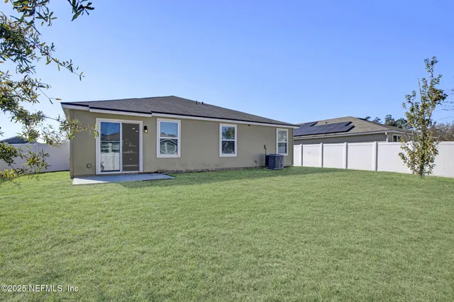 a view of a park with swings and slides