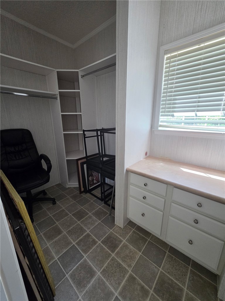 1400 Massey Road Pendleton, SC 29670 - Photo 19 of 25 Functional walk-in closet featuring ample storage and natural light.