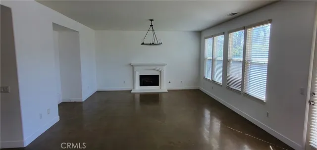 a view of a livingroom with a fireplace