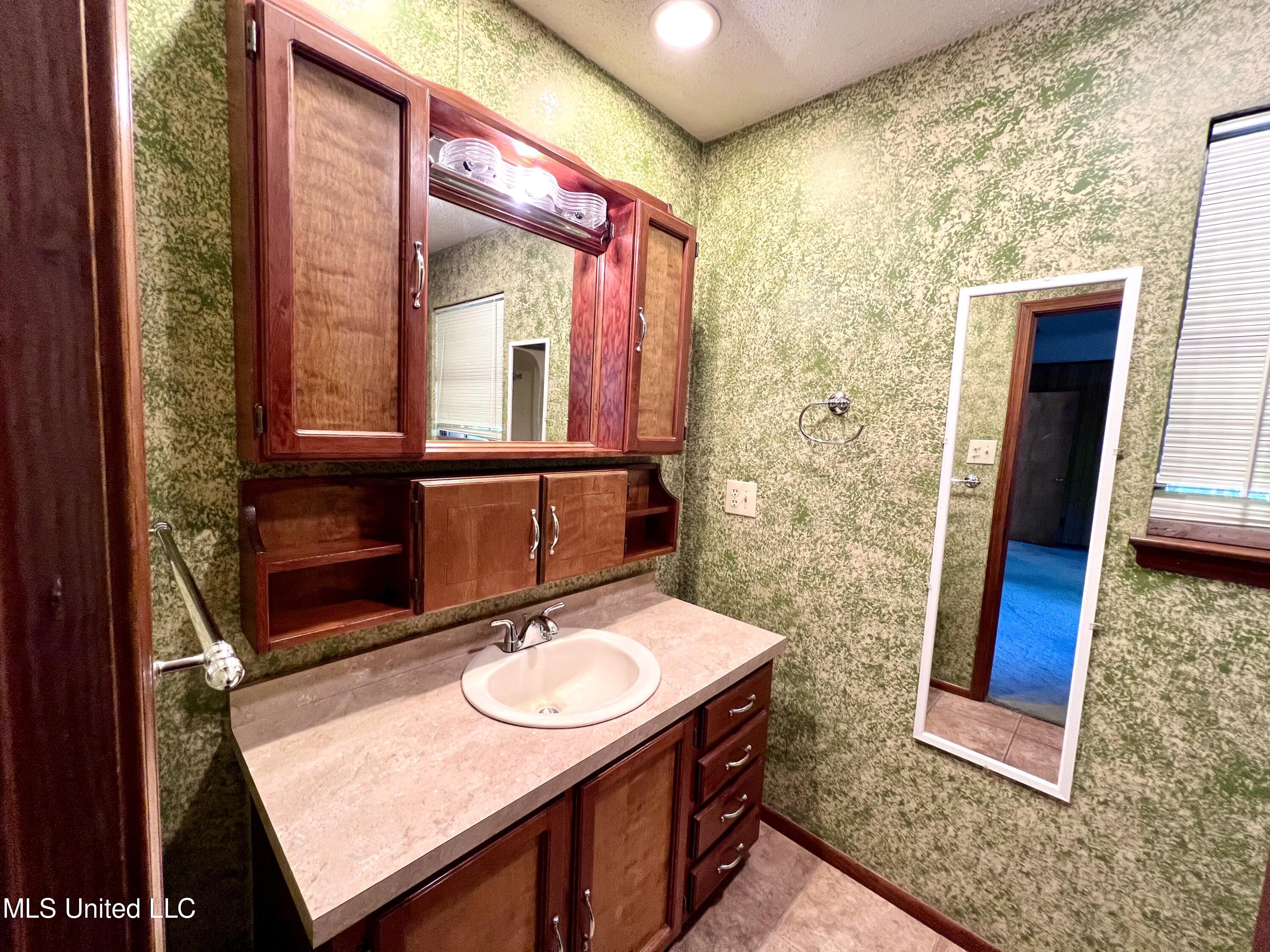 13820 Wolf Ridge Road Moss Point, MS 39562 - Photo 13 of 20 33B8ACFF-ADC8-47F8-9D90-137BF0DAB725