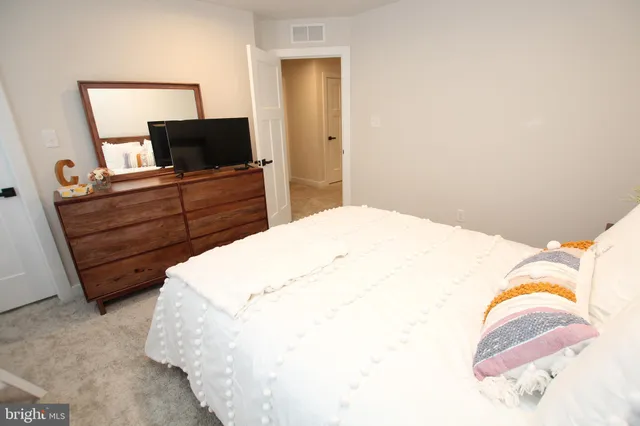 an empty room with a bathroom