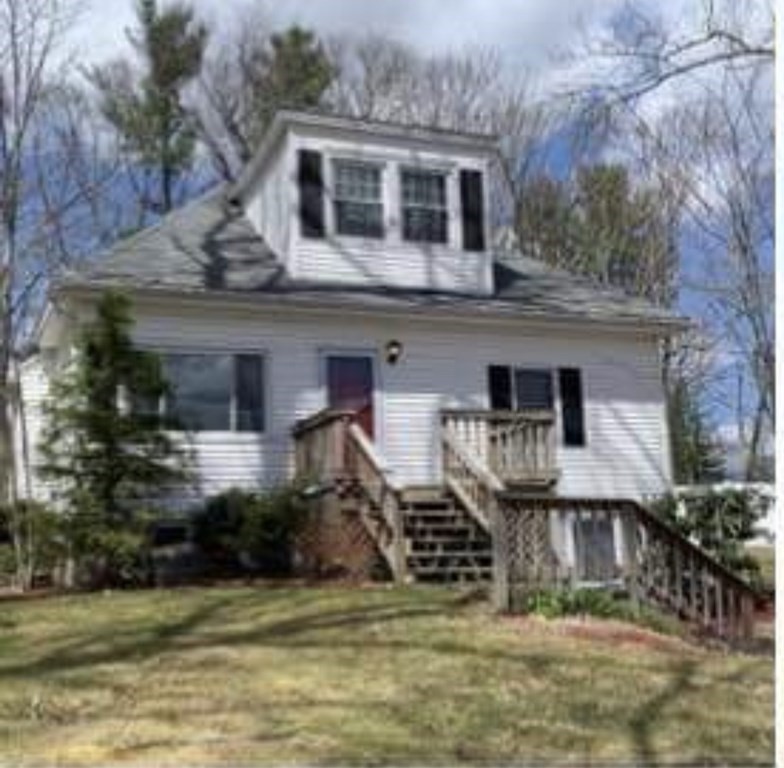 207 Allen Road Billerica, MA 01821 - Photo 1 of 2 a front view of a house with a yard