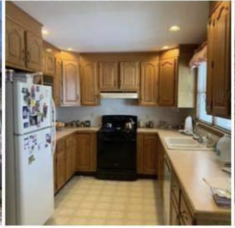 207 Allen Road Billerica, MA 01821 - Photo 2 of 2 a kitchen with stainless steel appliances granite countertop a stove a sink and a refrigerator