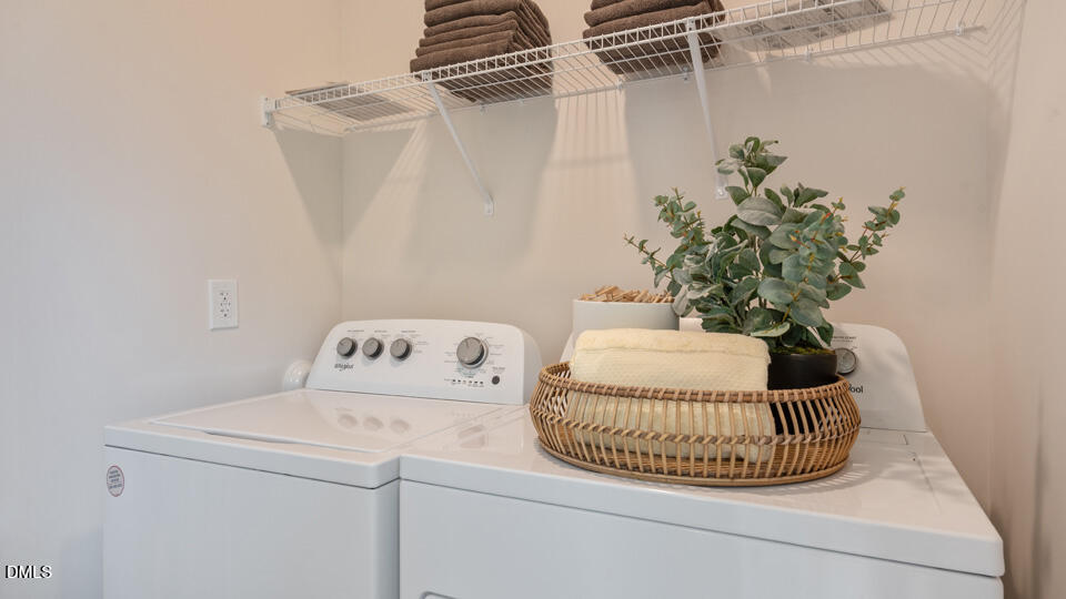 304 Perseus Street Angier, NC 27501 - Photo 29 of 34 a bathroom with a sink and a mirror