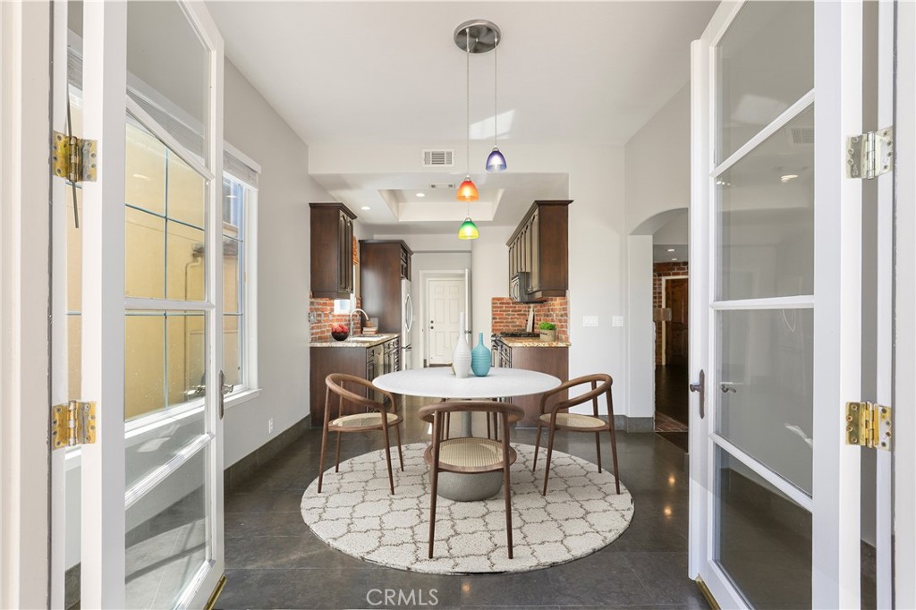 1175 Corte Riviera Camarillo, CA 93010 - Photo 15 of 23 a view of a dining room with furniture