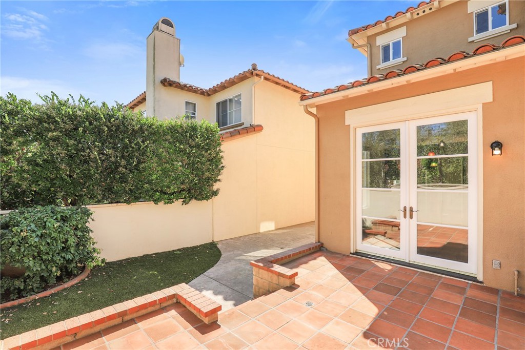 1175 Corte Riviera Camarillo, CA 93010 - Photo 18 of 23 a front view of a house with a yard