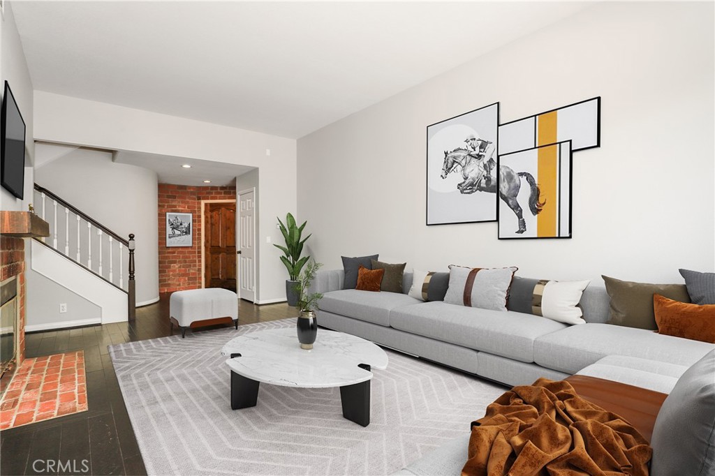 1175 Corte Riviera Camarillo, CA 93010 - Photo 2 of 23 a living room with furniture and wooden floor