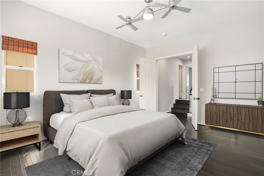 1175 Corte Riviera Camarillo, CA 93010 - Photo 10 of 23 a bedroom with a bed and a couch