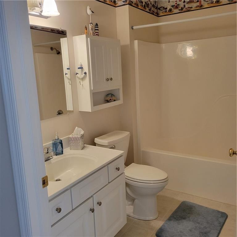 111 Wood Hawk Lane Butler, PA 16001 - Photo 13 of 13 a bathroom with a sink a toilet and shower