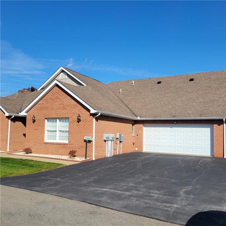 111 Wood Hawk Lane Butler, PA 16001 - Photo 3 of 13 a view of garage and yard