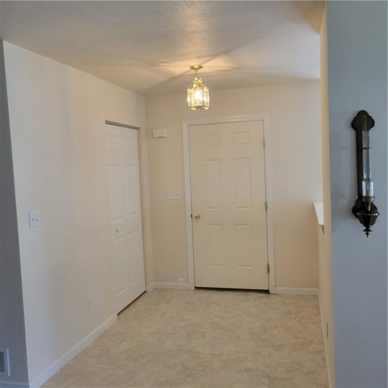111 Wood Hawk Lane Butler, PA 16001 - Photo 4 of 13 an empty room with windows