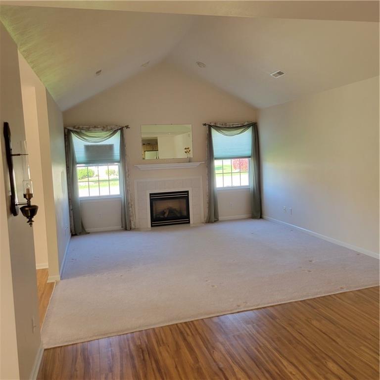 111 Wood Hawk Lane Butler, PA 16001 - Photo 6 of 13 an empty room with windows and fireplace