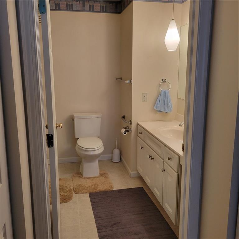 111 Wood Hawk Lane Butler, PA 16001 - Photo 10 of 13 a spacious bathroom with a granite countertop toilet and a sink