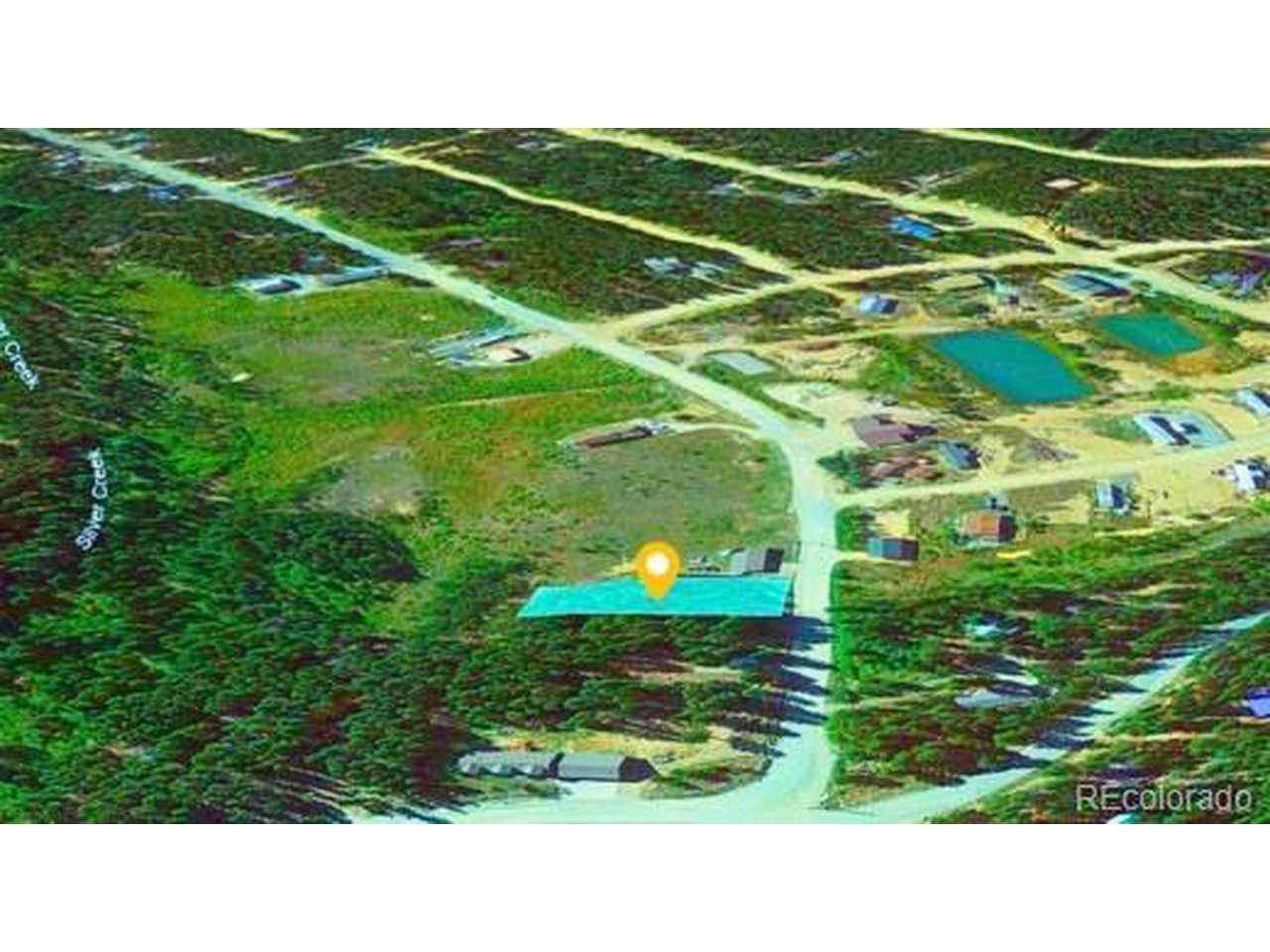 47 Silver Creek Road Idaho Springs, CO 80452 - Photo 7 of 7 a open area with grassy field