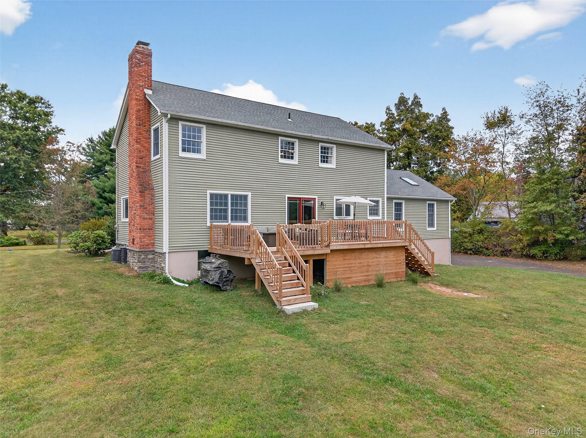 214 Dubois Road Gardiner, NY 12561 - Photo 29 of 38 a front view of house with yard and trees in the background