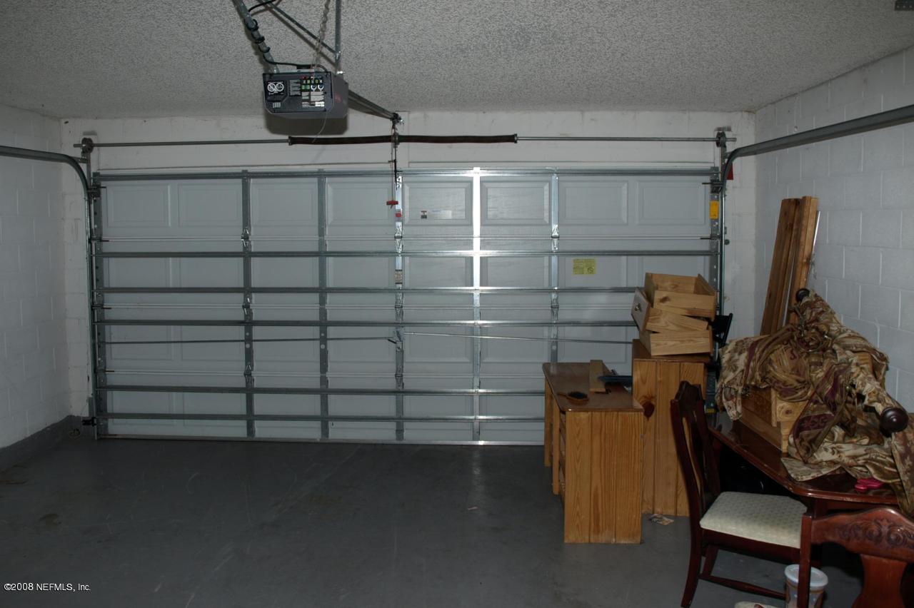 7387 Spring Hill Road Jacksonville, FL 32244 - Photo 8 of 15 a view of a room with racks on the wall