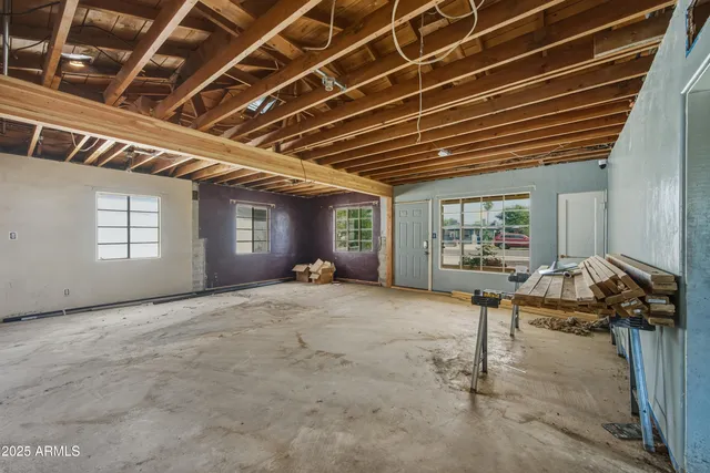 a view of livingroom with furniture and windows