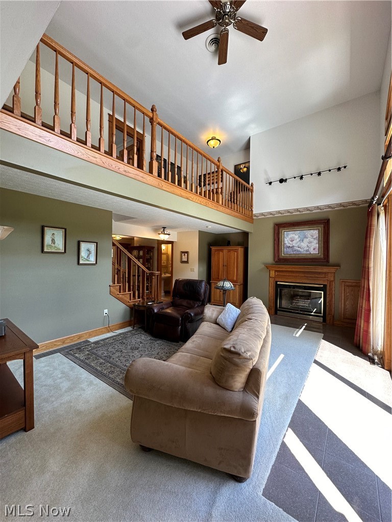 5233 Secrest Road Wooster, OH 44691 - Photo 29 of 33 Living room featuring ceiling fan