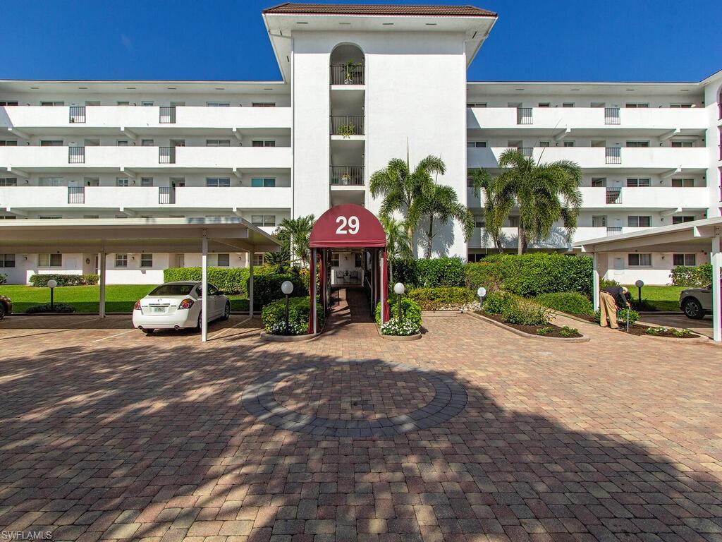 29 High Point Circle East, Unit 307 Naples, FL 34103 - Photo 1 of 14