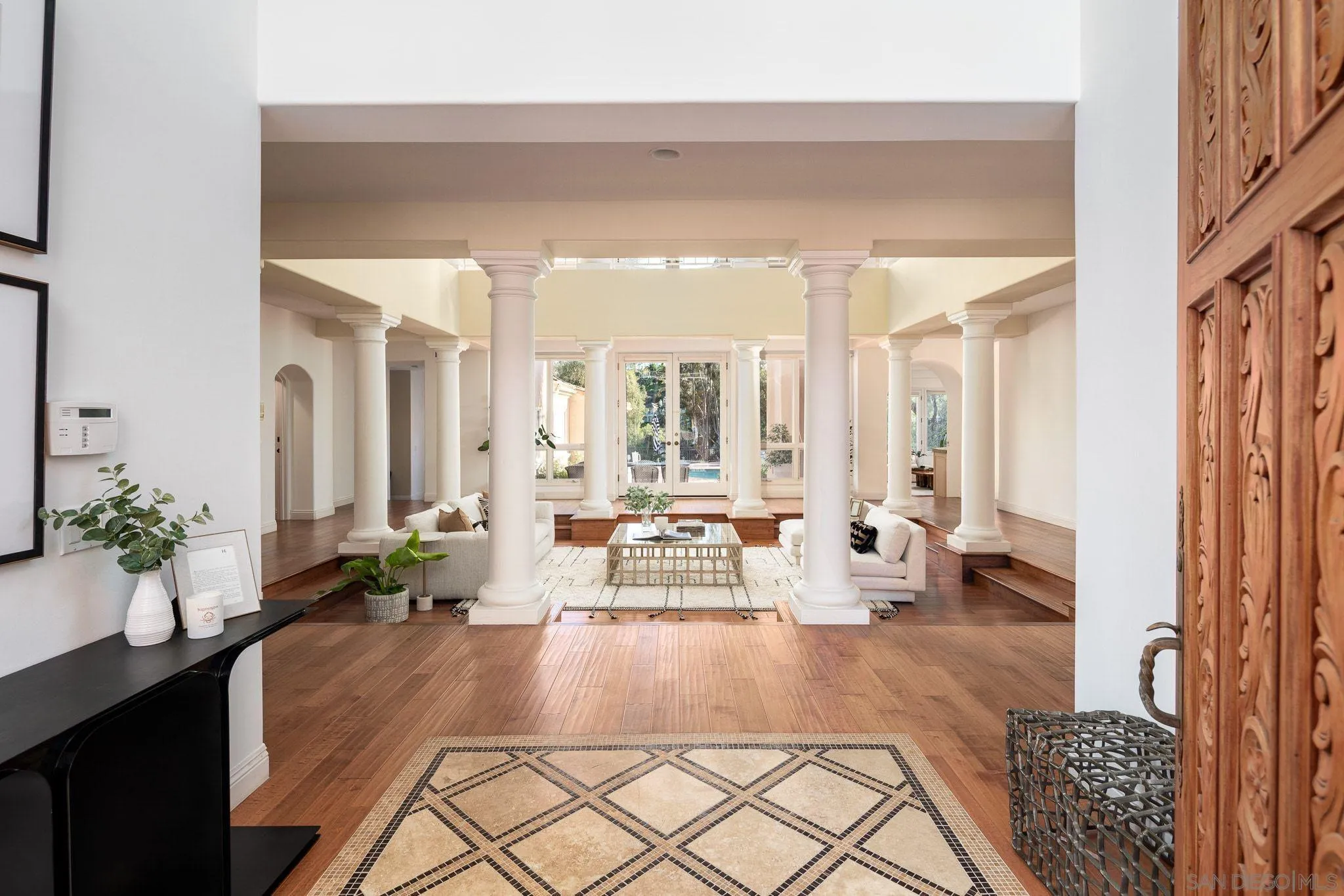 17249 Camino De Montecillo Rancho Santa Fe, CA 92067 - Photo 4 of 21 a living room with furniture and a large window