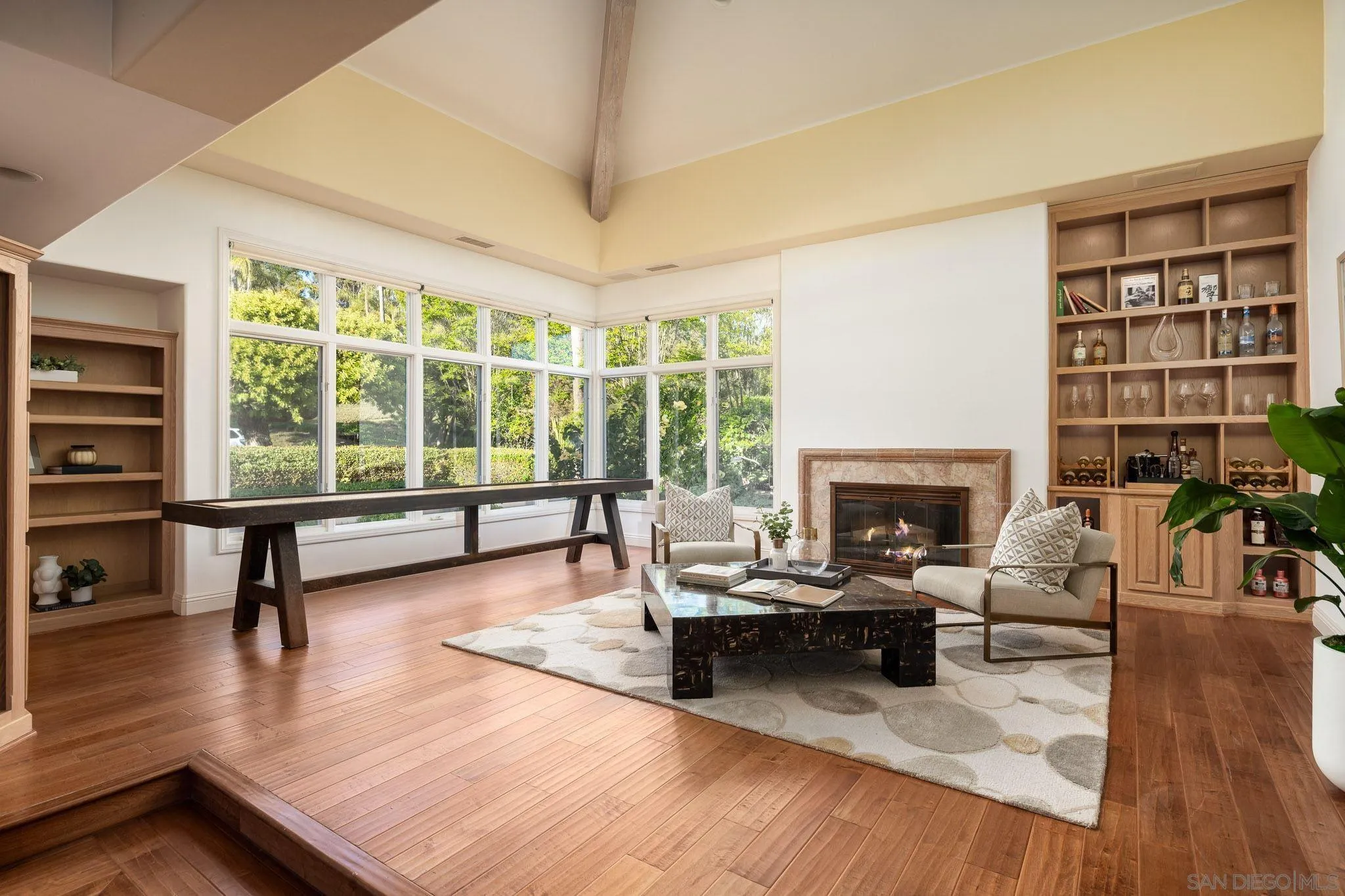 17249 Camino De Montecillo Rancho Santa Fe, CA 92067 - Photo 6 of 21 a living room with furniture and a fireplace