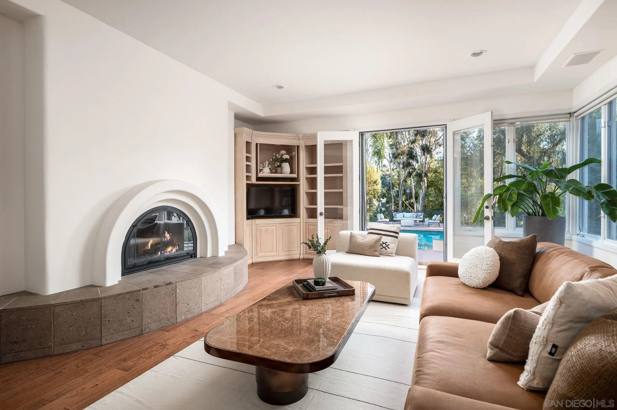 17249 Camino De Montecillo Rancho Santa Fe, CA 92067 - Photo 7 of 21 a living room with furniture and a large window