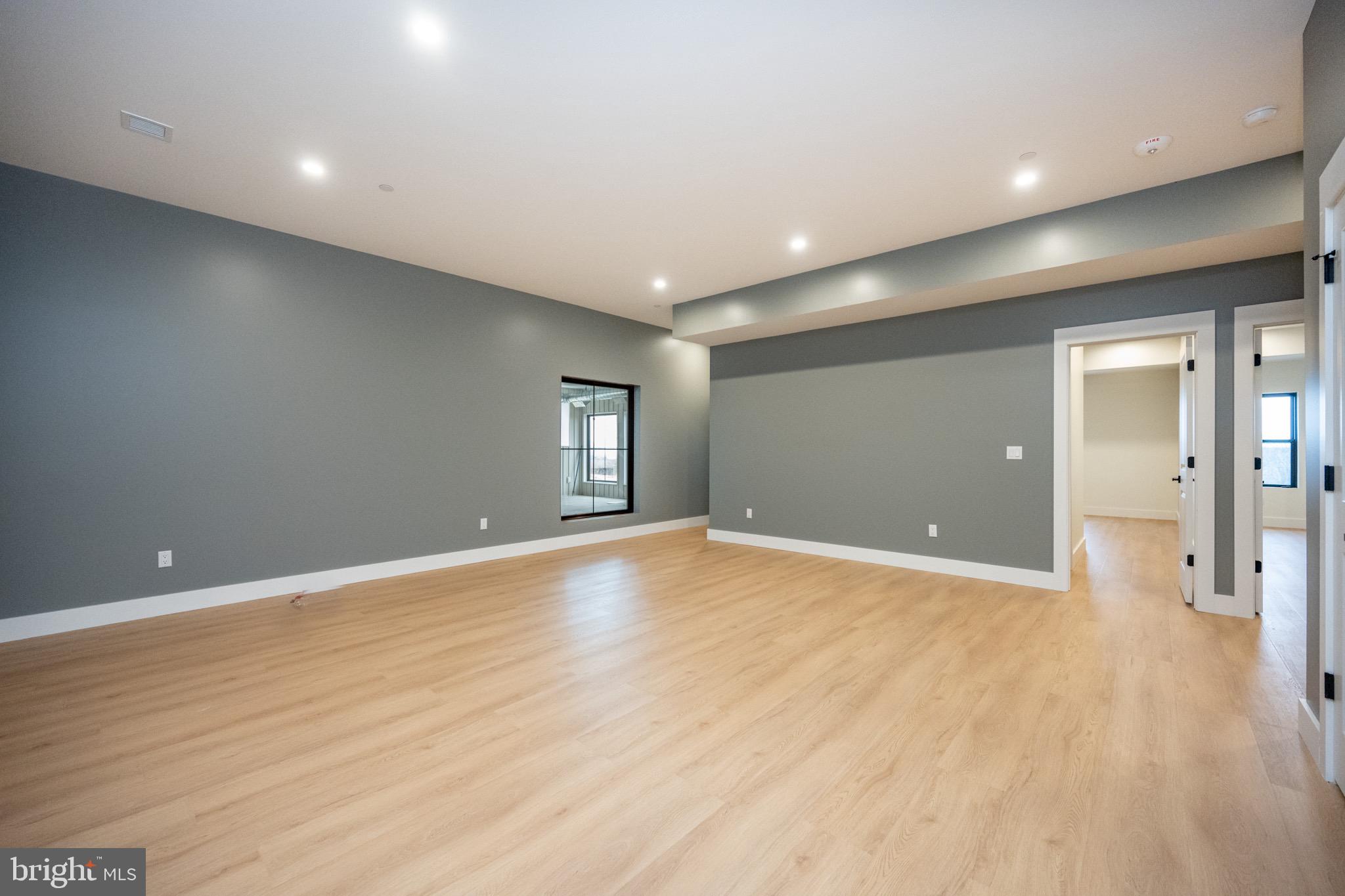 353 Lower Camp Road McHenry, MD 21541 - Photo 23 of 67 a view of an empty room with wooden floor