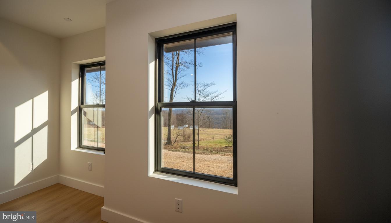 353 Lower Camp Road McHenry, MD 21541 - Photo 42 of 67 a view of an empty room with a window