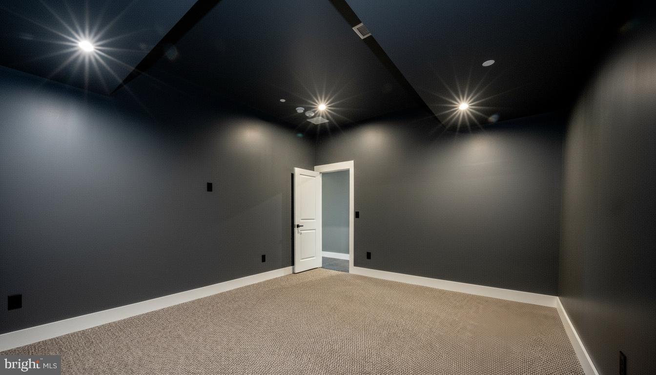 353 Lower Camp Road McHenry, MD 21541 - Photo 44 of 67 an empty room with staircase and wooden floor