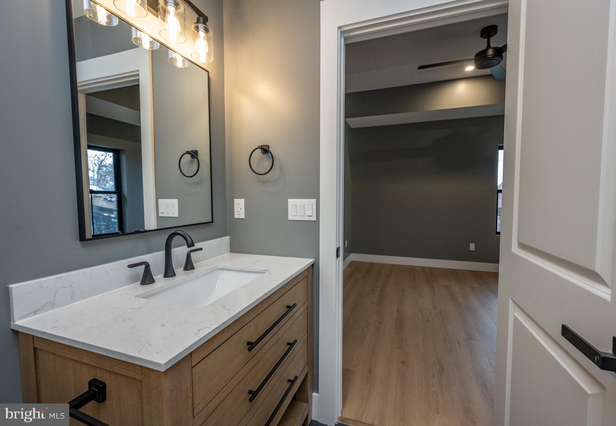 353 Lower Camp Road McHenry, MD 21541 - Photo 48 of 67 a bathroom with a sink and a mirror
