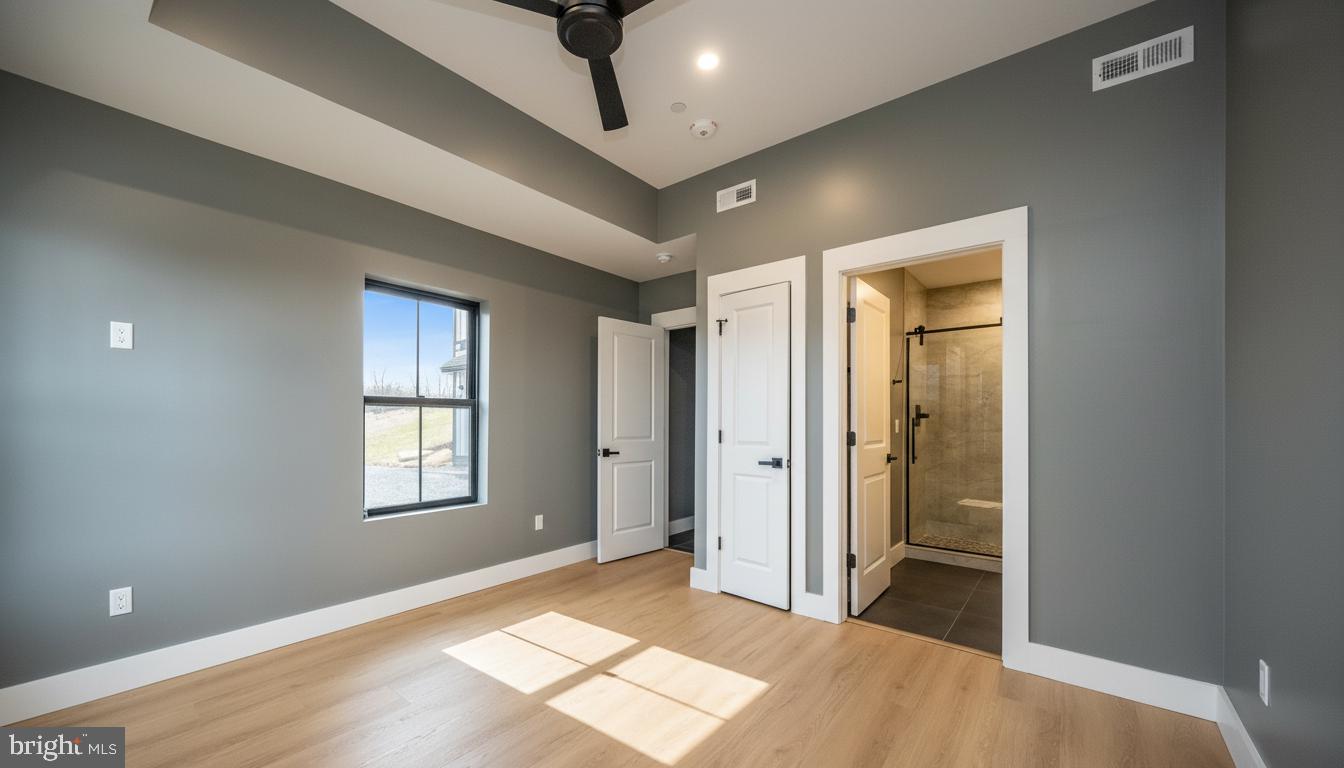 353 Lower Camp Road McHenry, MD 21541 - Photo 51 of 67 a view of livingroom with a ceiling fan and window