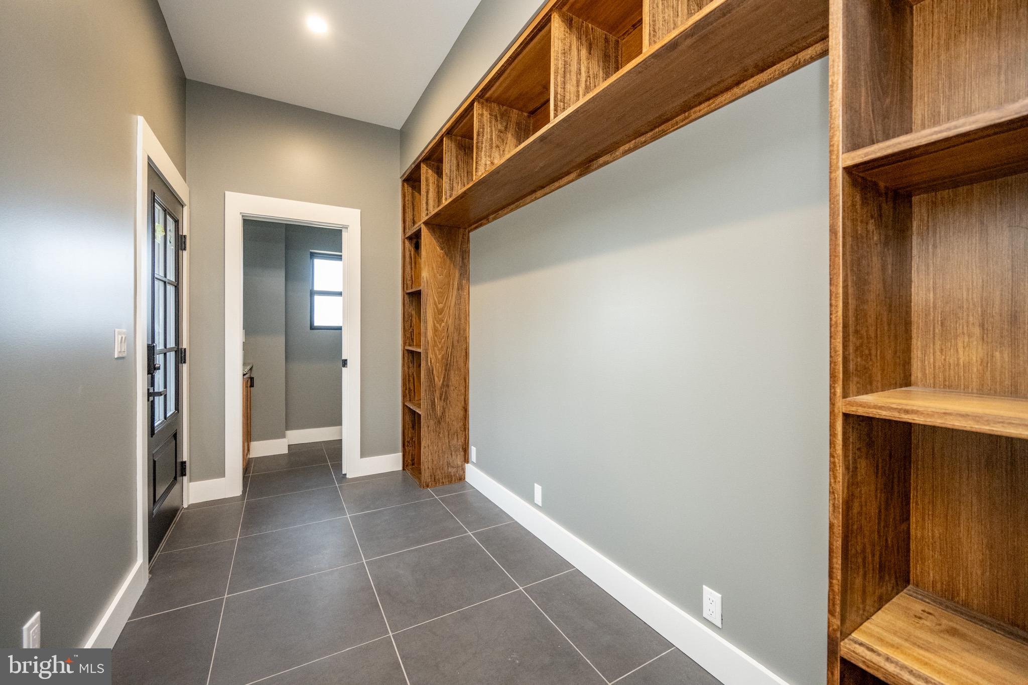 353 Lower Camp Road McHenry, MD 21541 - Photo 53 of 67 a view of a hallway with wooden floor and staircase