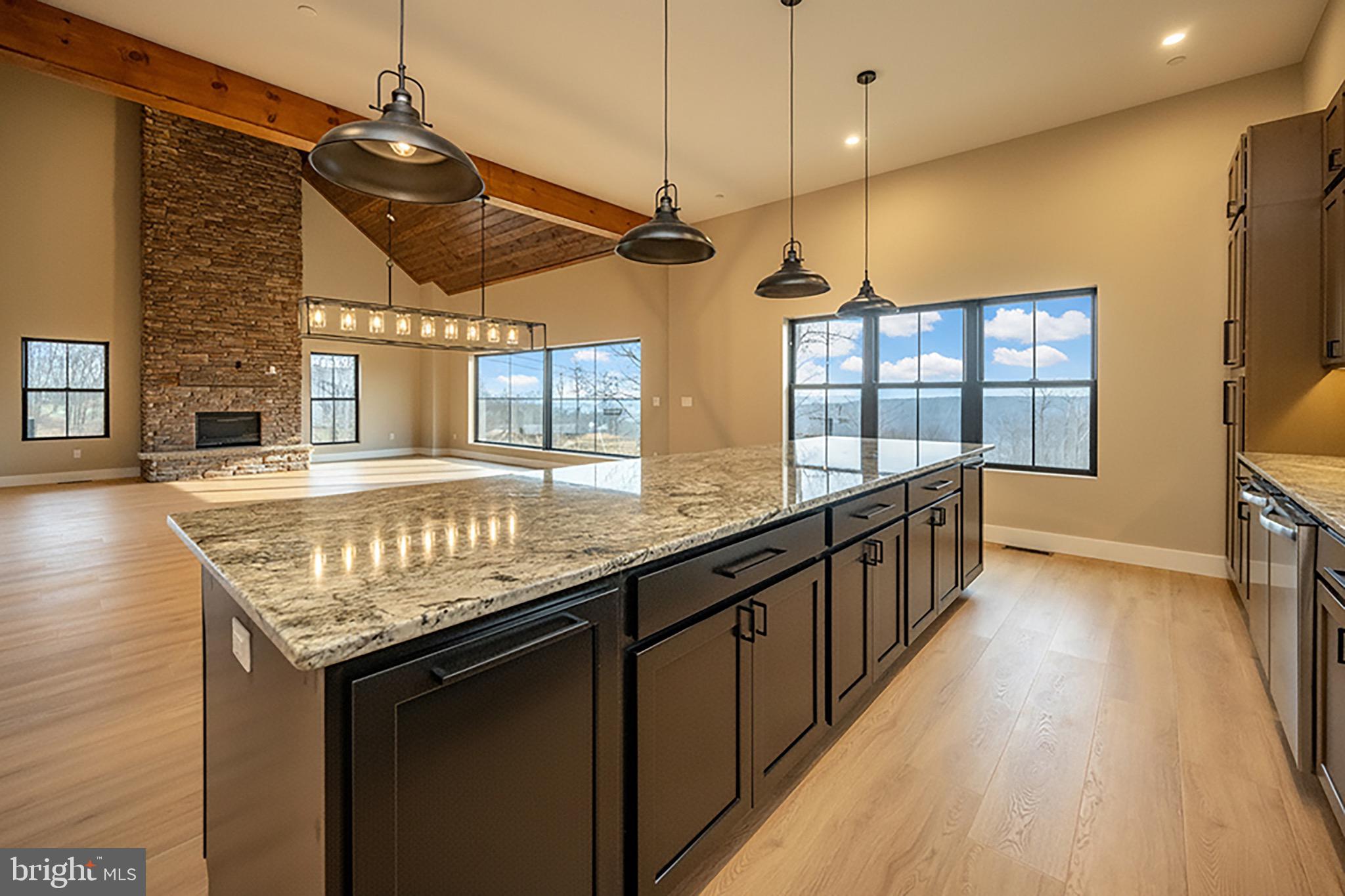 353 Lower Camp Road McHenry, MD 21541 - Photo 10 of 67 a kitchen with granite countertop counter space a sink and appliances