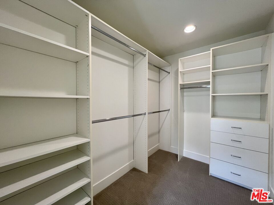 11715 Bellagio Road, Unit 204 Los Angeles, CA 90049 - Photo 11 of 27 a view of an empty walk in closet