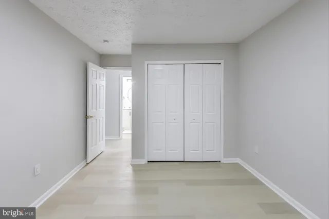 a balcony with wooden floor
