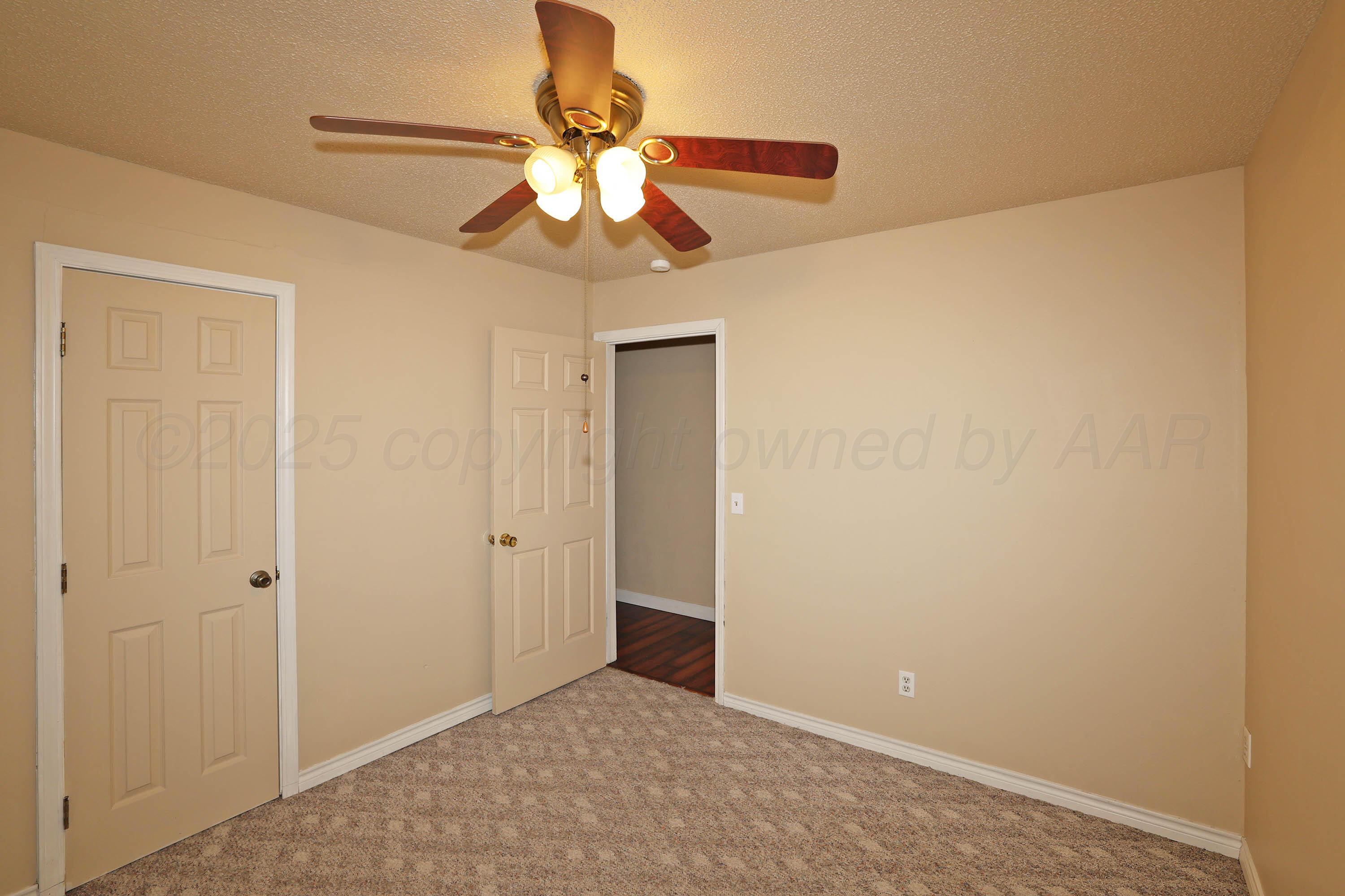 4445 South Travis Street Amarillo, TX 79110 - Photo 18 of 32 a view of an empty room