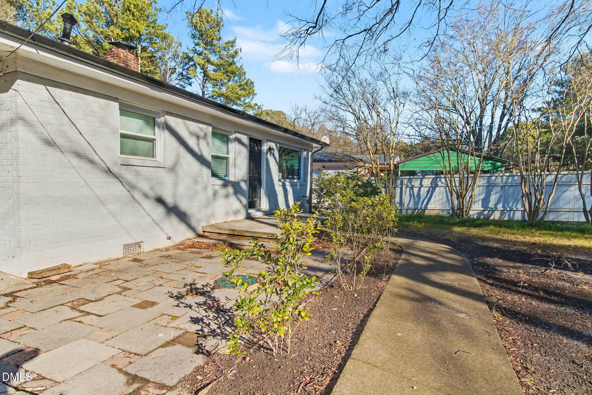 626 South Hoover Road Durham, NC 27703 - Photo 18 of 21 a front view of a house with a yard