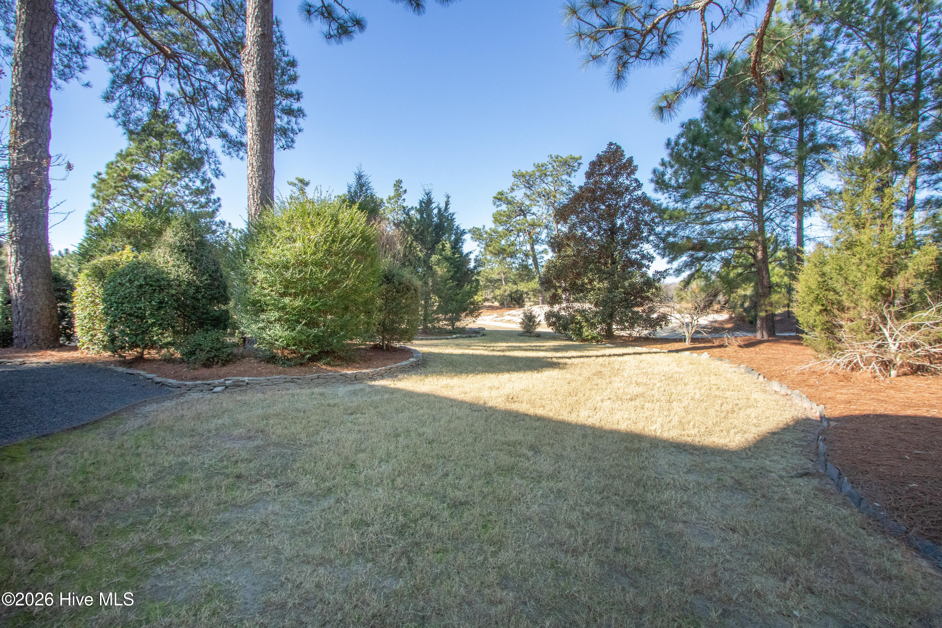 30 Spring Valley Court Pinehurst, NC 28374 - Photo 61 of 66 SideYard1