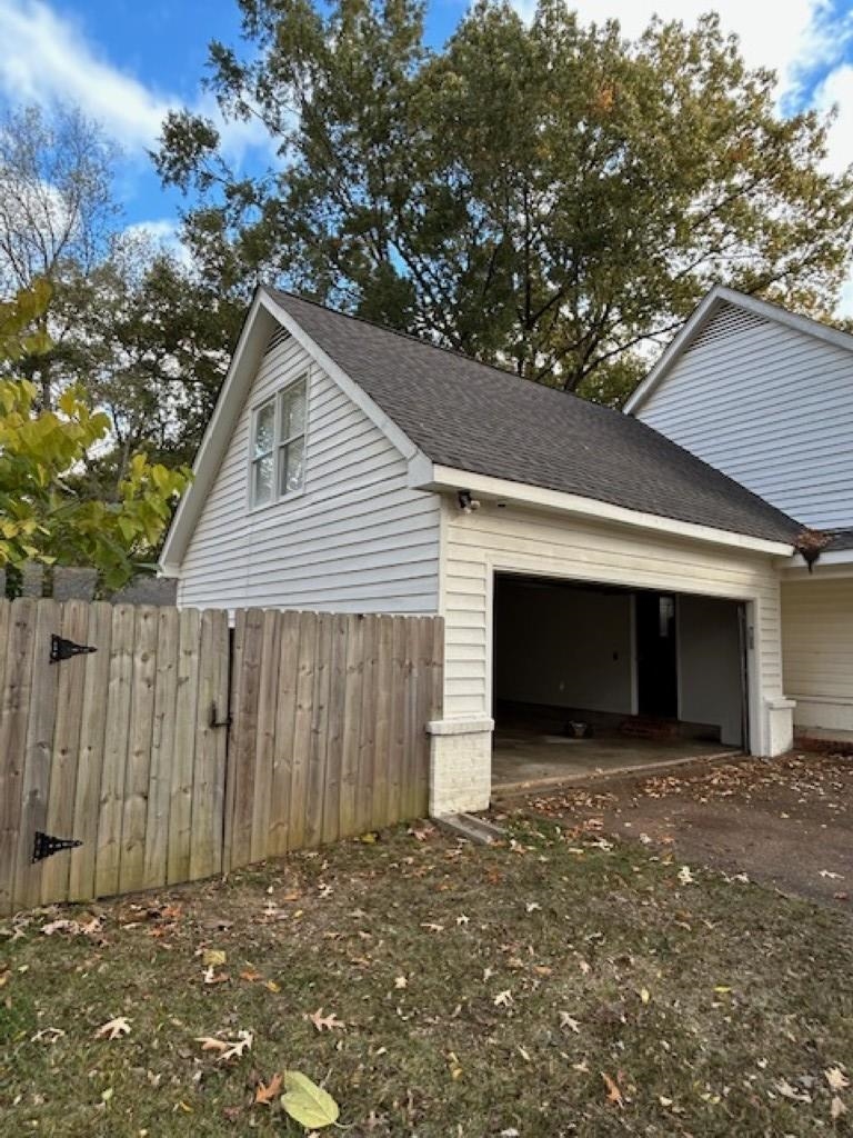 496 Quail Crest Drive Collierville, TN 38017 - Photo 21 of 23 a view of a house with a garage