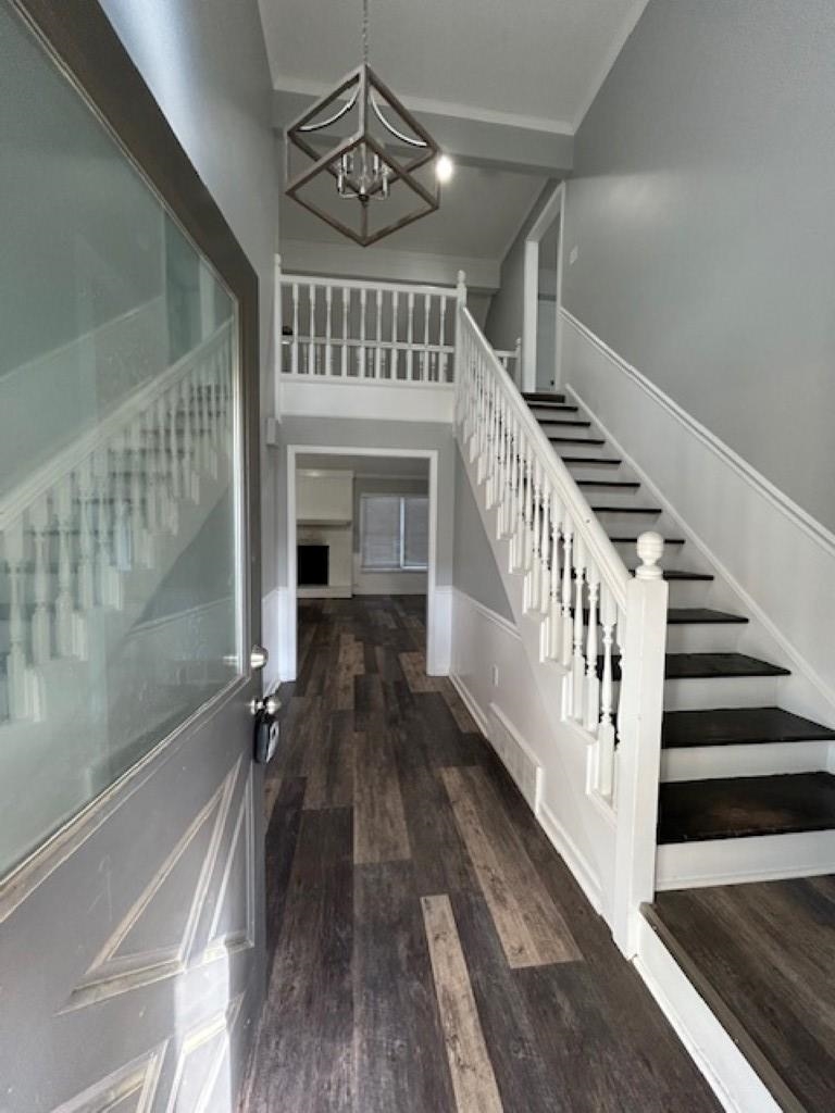 496 Quail Crest Drive Collierville, TN 38017 - Photo 7 of 23 a view of entryway and hall with wooden floor