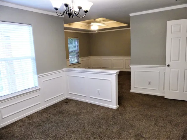 a view of a kitchen with a sink and dishwasher