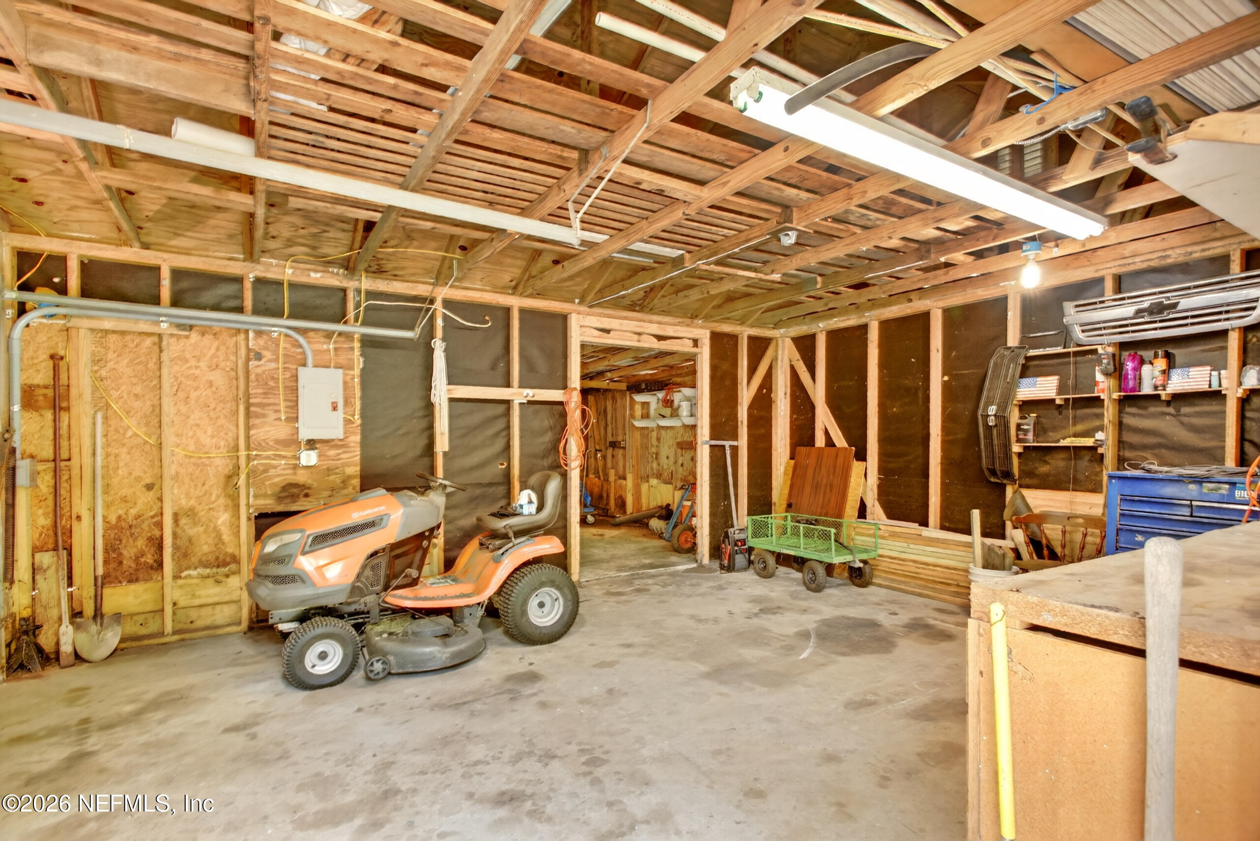 2817 Haddock Road Jacksonville, FL 32218 - Photo 55 of 77 1 Car Garage w/Extra Storage