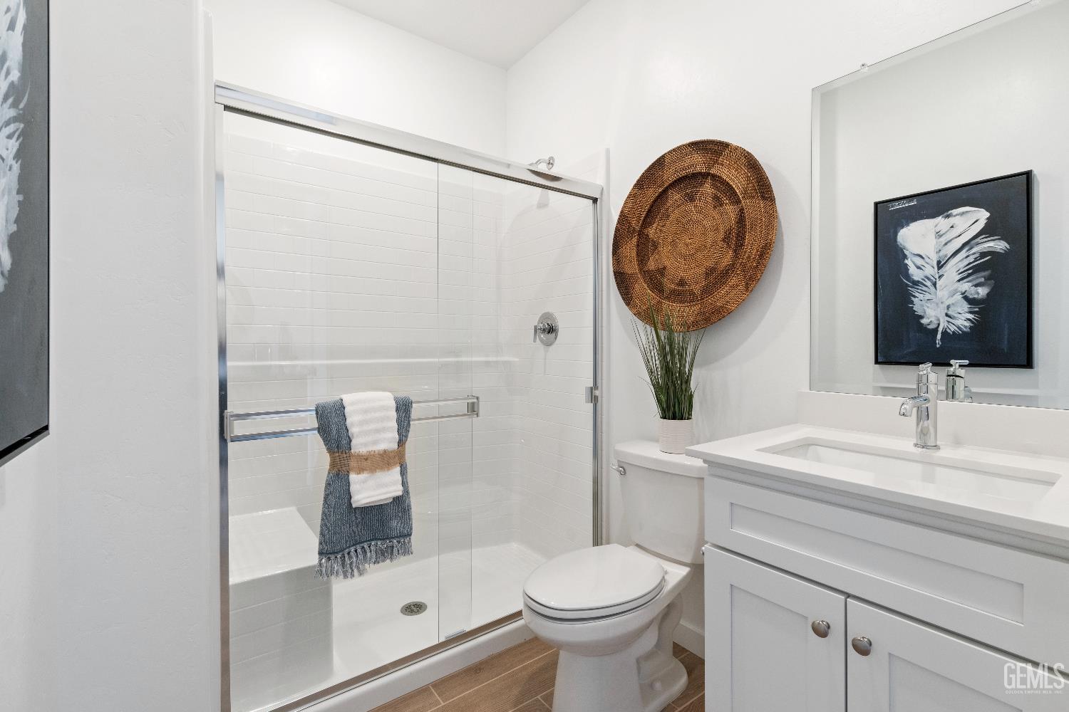 Undisclosed Address Shafter, CA 93263 - Photo 19 of 21 a bathroom with a toilet a sink and a mirror