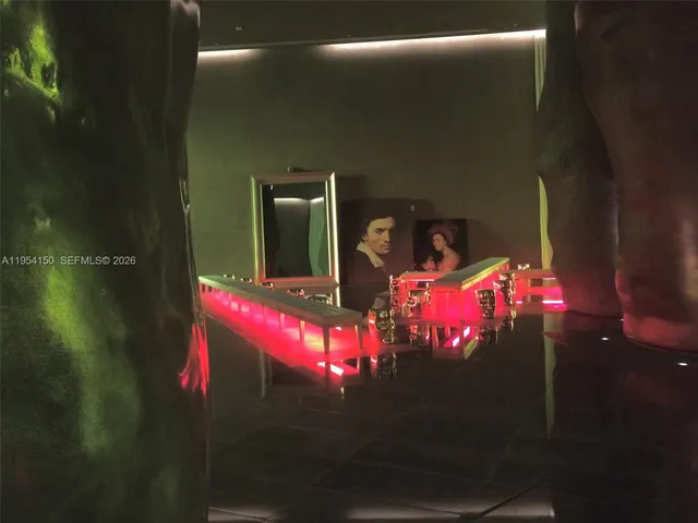 a room with furniture and air hockey table