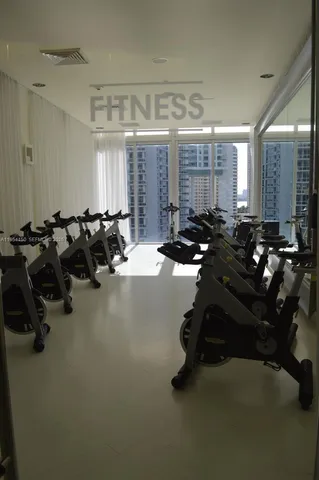 a view of swimming pool with outdoor seating