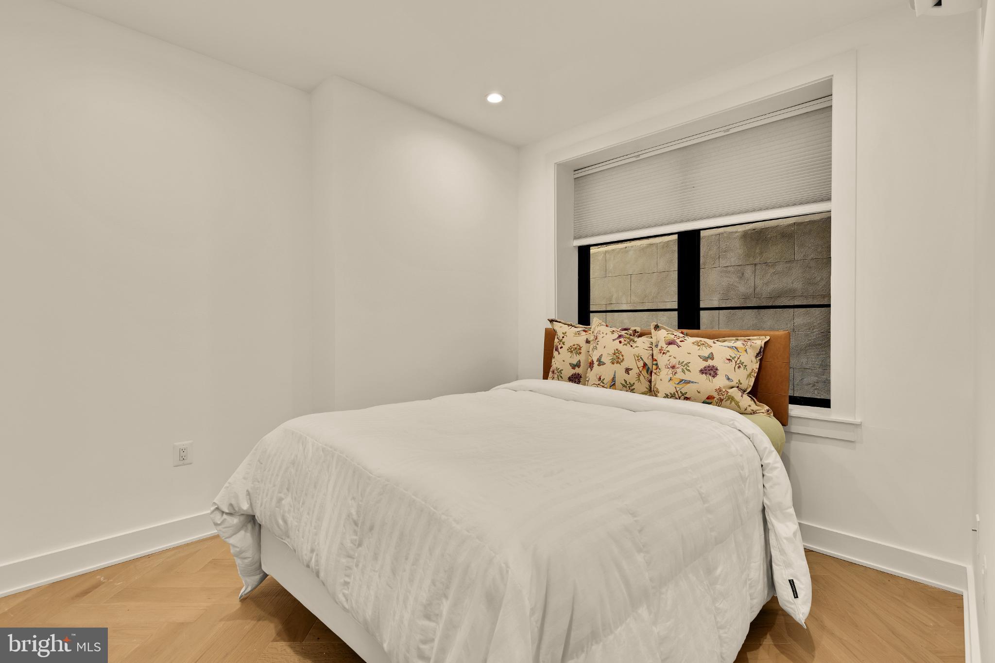 1225 11th Street Northwest, Unit 2 Washington, DC 20001 - Photo 15 of 20 Serene bedroom with natural light.