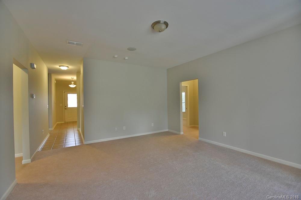 2328 Celandine Way Tega Cay, SC 29708 - Photo 3 of 15 a view of an empty room with a bathroom