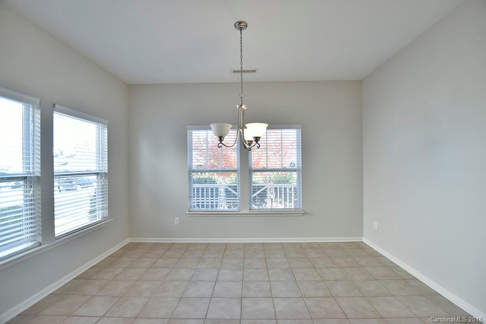 2328 Celandine Way Tega Cay, SC 29708 - Photo 5 of 15 a view of an empty room with a window
