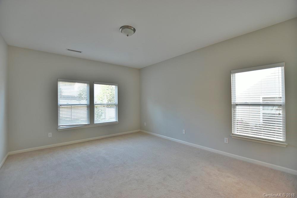 2328 Celandine Way Tega Cay, SC 29708 - Photo 8 of 15 a view of an empty room with a window